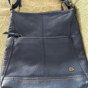 The Sak navy leather crossbody